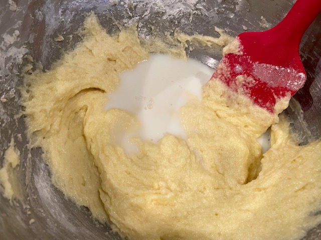 Fold in 1/2 the milk at a time