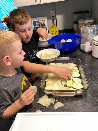 Boys adding the layers