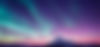 Northern lights above mountains.jpeg