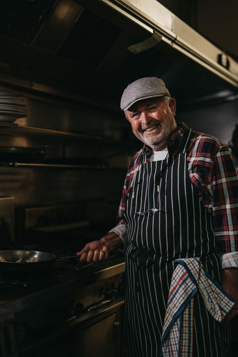Head chef of Italian restaurant in East Melbourne preparing dishes with decades of experience