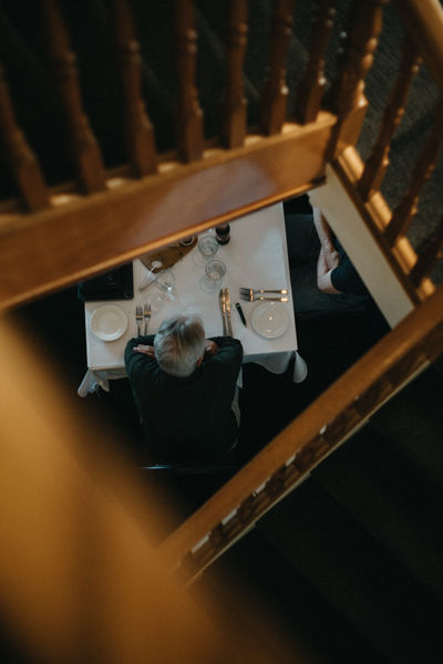 Overhead view of guests dining at Italian restaurant in East Melbourne