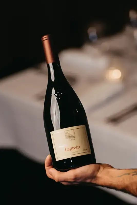 Wine bottle presented at Italian restaurant in Melbourne with curated wine pairing experience