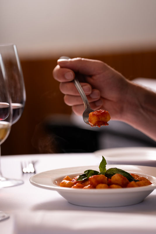 Italian gnocchi pasta dish in Melbourne served with tomato sauce and fresh basil