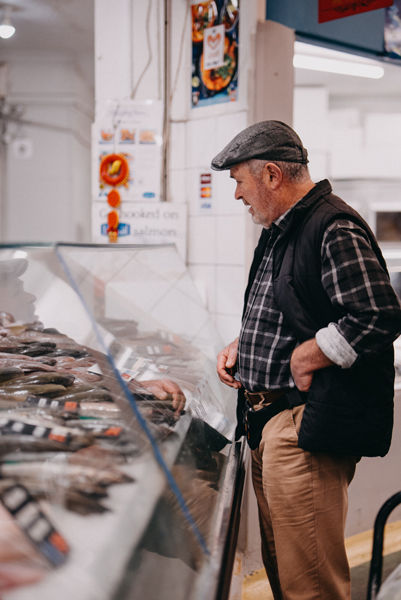 Chef selecting fresh ingredients at market for Italian restaurant in Melbourne