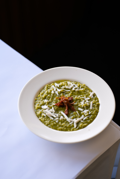 Italian risotto dish served in Melbourne restaurant with creamy texture and herbs