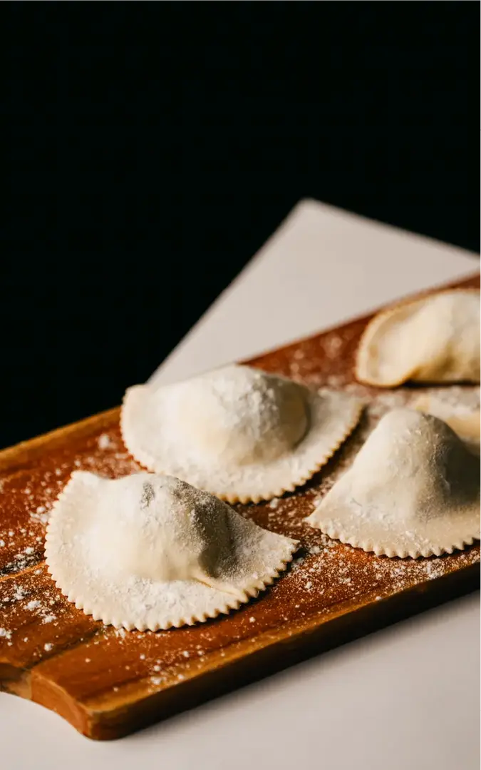 Handmade ravioli pasta prepared at an Italian restaurant in Melbourne showcasing fresh ingredients and traditional cuisine