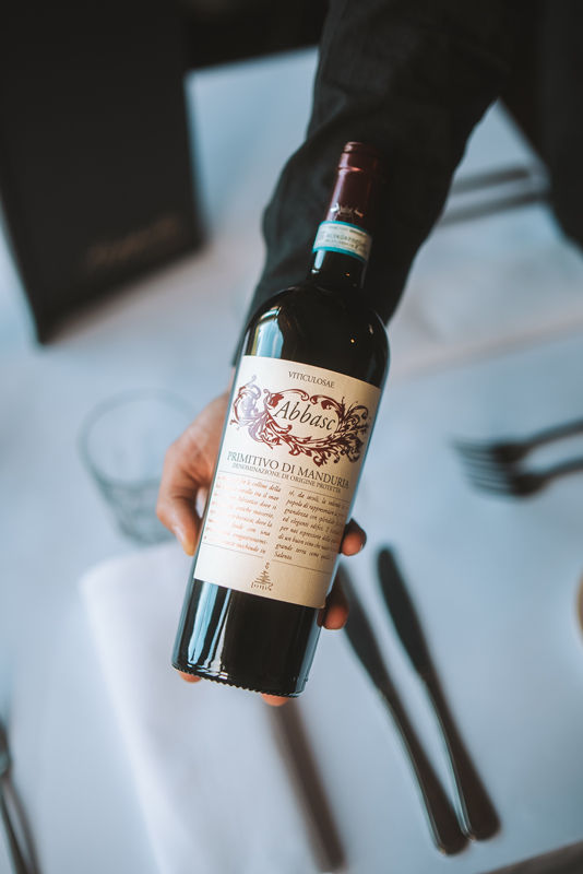 Italian red wine bottle served at restaurant in Melbourne with curated wine list and dining experience