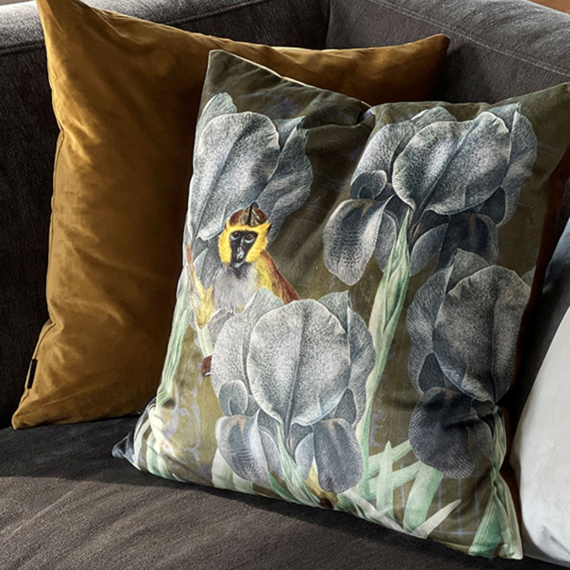 Monkey Sitting in Irises Velvet Cushion