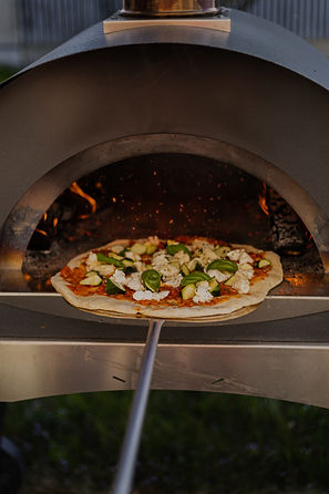 pizza on white ceramic plate_edited.jpg