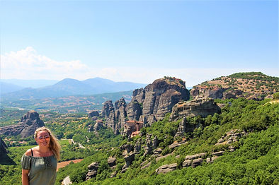 Women standing in front of a scenic view