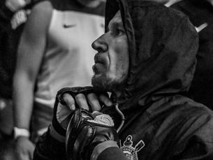 a man in tough situation, preparing to a fight
