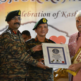 Maj Gen Paranvir Singh Punia, SM, VSM and Brigadier Rajat Mohan Bhatt (Phd) receiving the URF World Record Certificate from lieutenant governors of Jammu and Kashmir, Shri Manoj Sinha