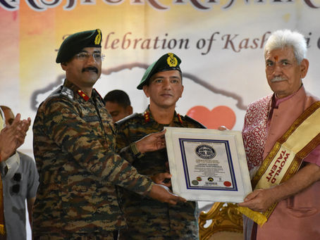 Maj Gen Paranvir Singh Punia, SM, VSM and Brigadier Rajat Mohan Bhatt (Phd) receiving the URF World Record Certificate from lieutenant governors of Jammu and Kashmir, Shri Manoj Sinha