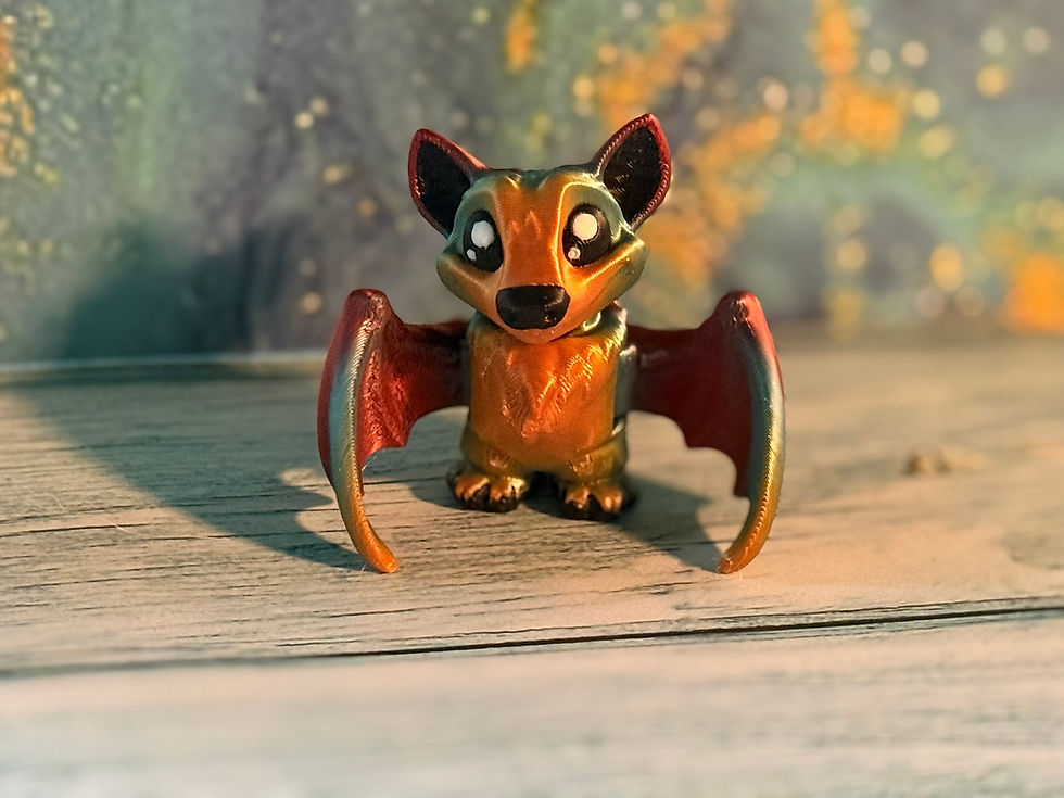 Thumbnail: Cute 3D printed bat figurine with folded wings.