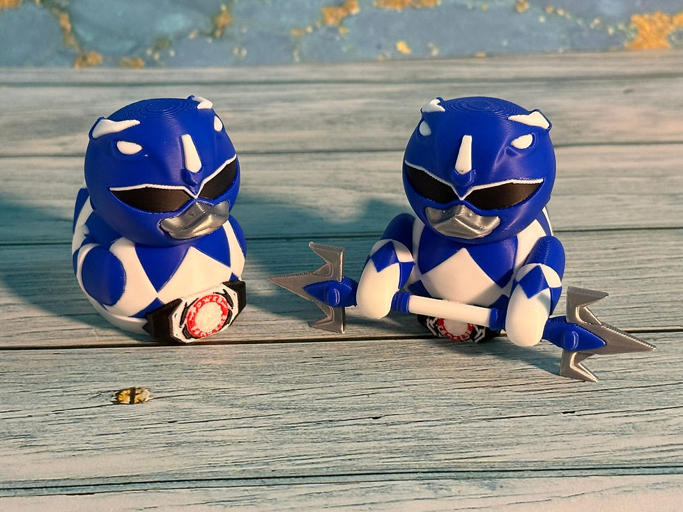 Thumbnail: Blue Tricera Guardian Duck 3D printed collectible featuring blue and white armor, Triceratops-inspired helmet, black visor, s