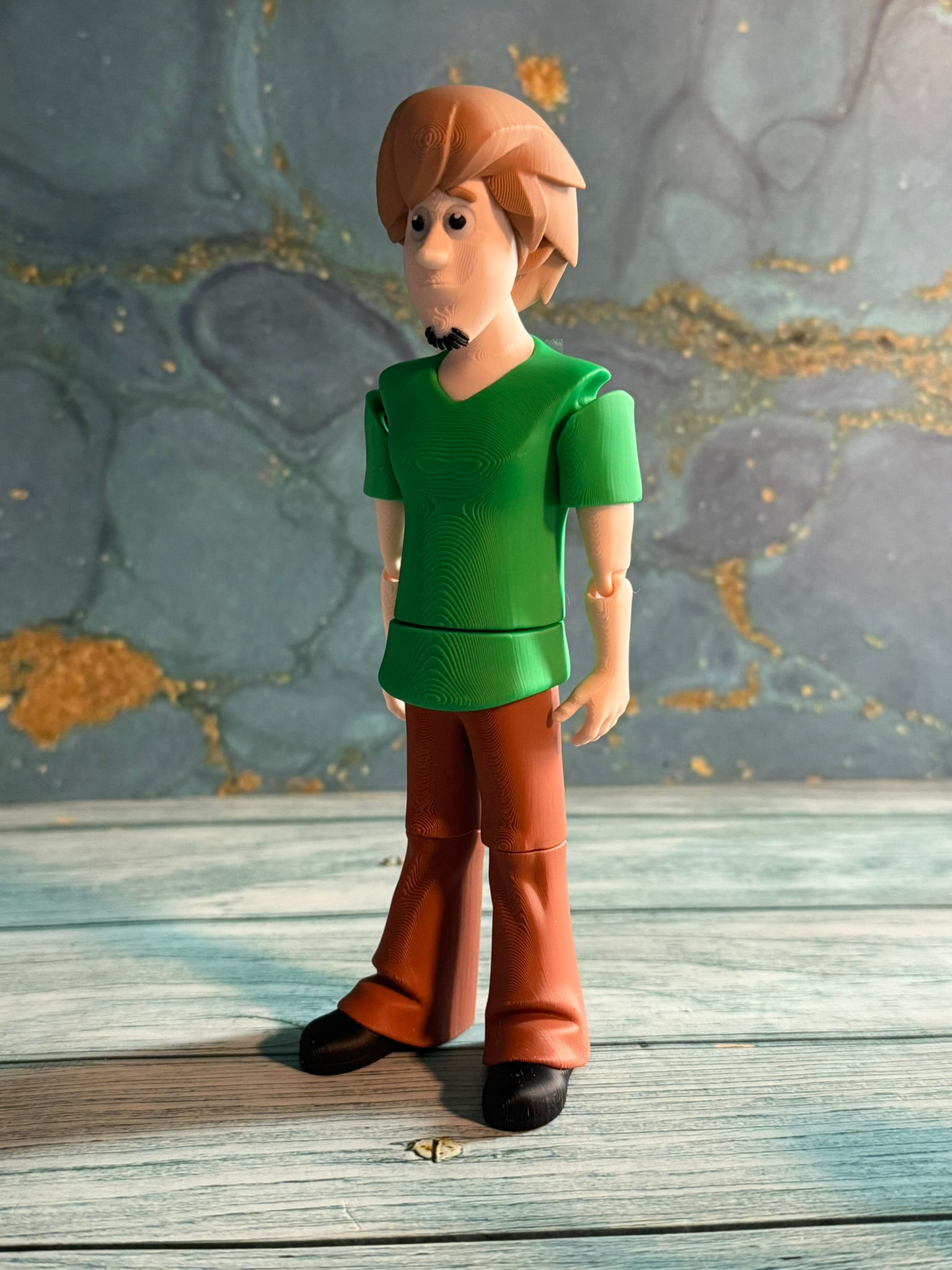 Mystery-Solving Snack Detective figure wearing a green shirt, brown pants, and black shoes, measuring 7 x 2 inches with a fla