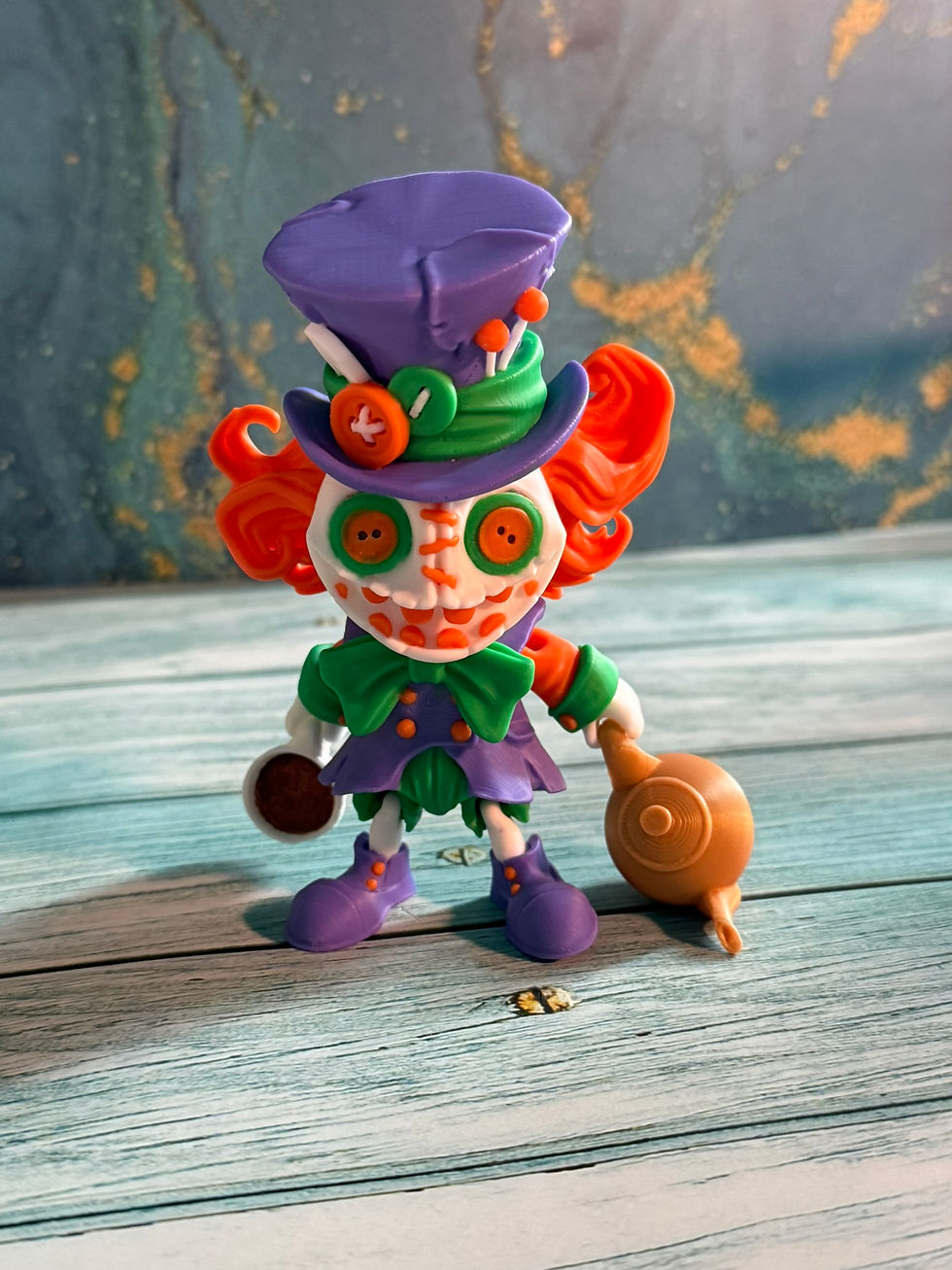 Thumbnail: Creepy cute skeleton figurine with orange hair and purple hat