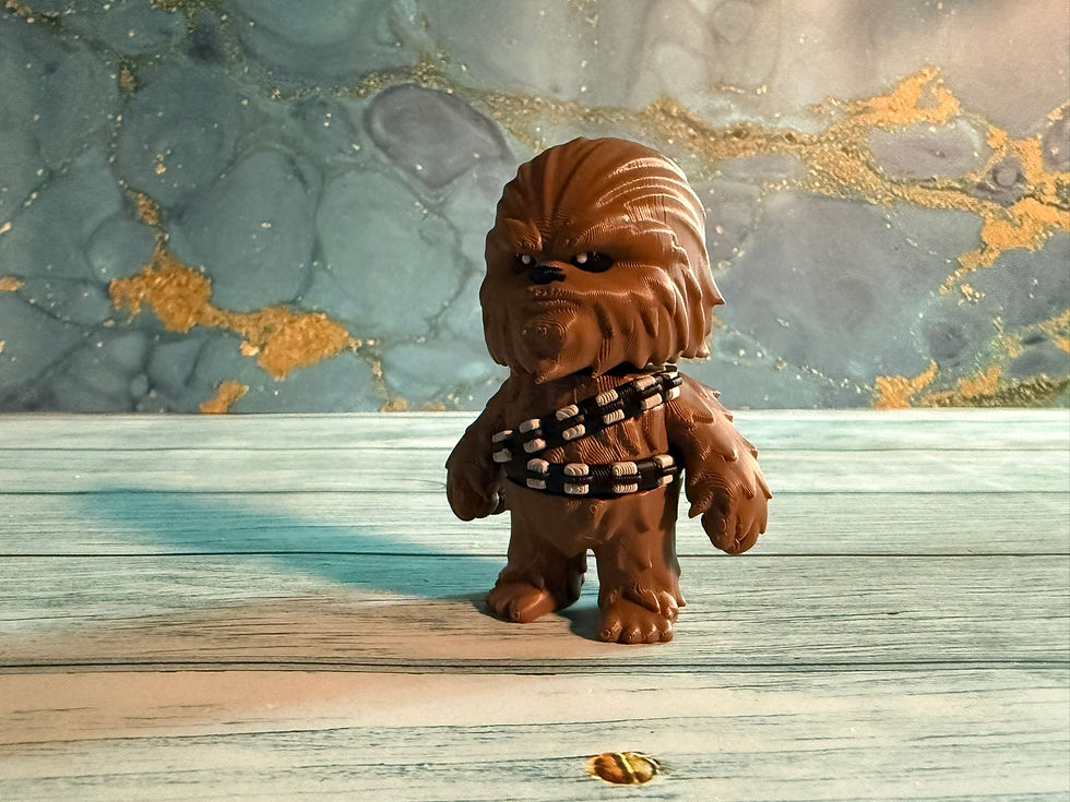 Articulated 3D printed Galactic Wookie Warrior figure measuring approximately 3.5 x 2.5 inches with textured brown fur, detai