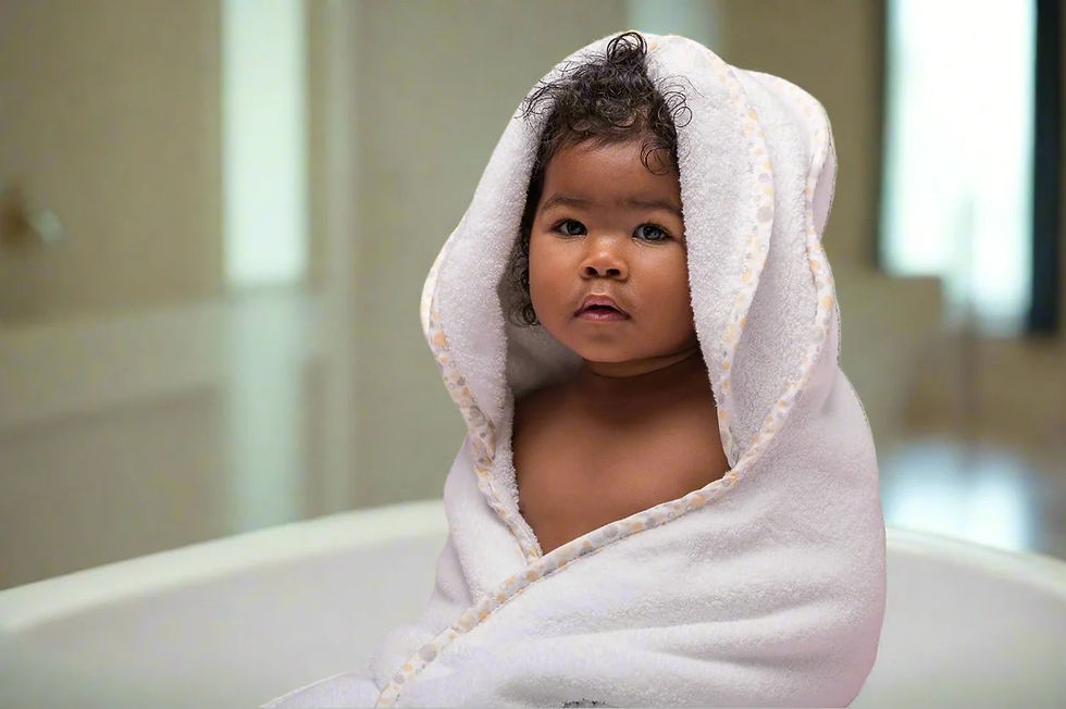 Soft yellow hooded towel for baby bath time in the USA