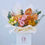 Thumbnail: Spring Morning Bouquet beautifully arranged in a white Divine Boutique gift box.