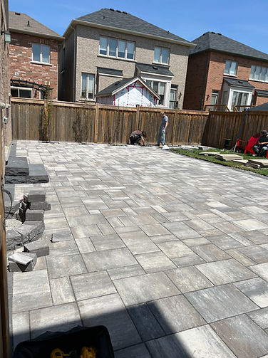 Beautiful interlock patio installation by Estate Landscaping in Oshawa, featuring high-quality stonework.