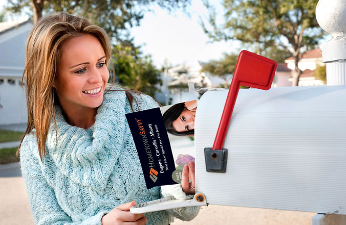 Hometown Savvy dircect mail magazine being retrieved from a consumers home mailbox.