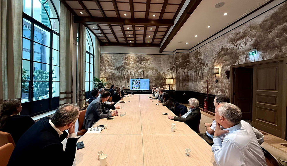 Attendees at a network meeting viewing a presentation