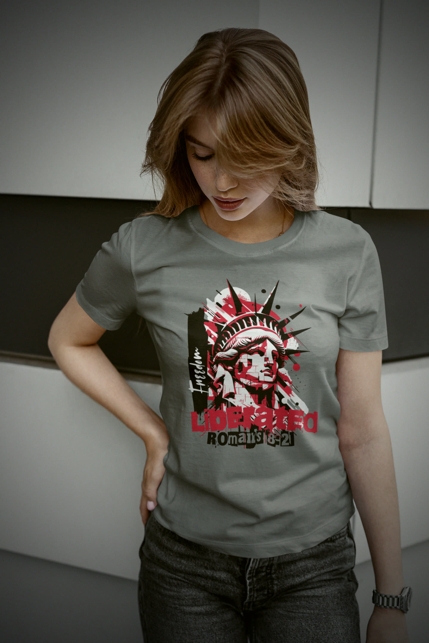 Woman wearing the Liberated Romans 8:21 tee