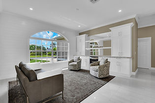 Modern Shiplap Living Room and Bar Renovation in Naples, FL by The Limitless Designer