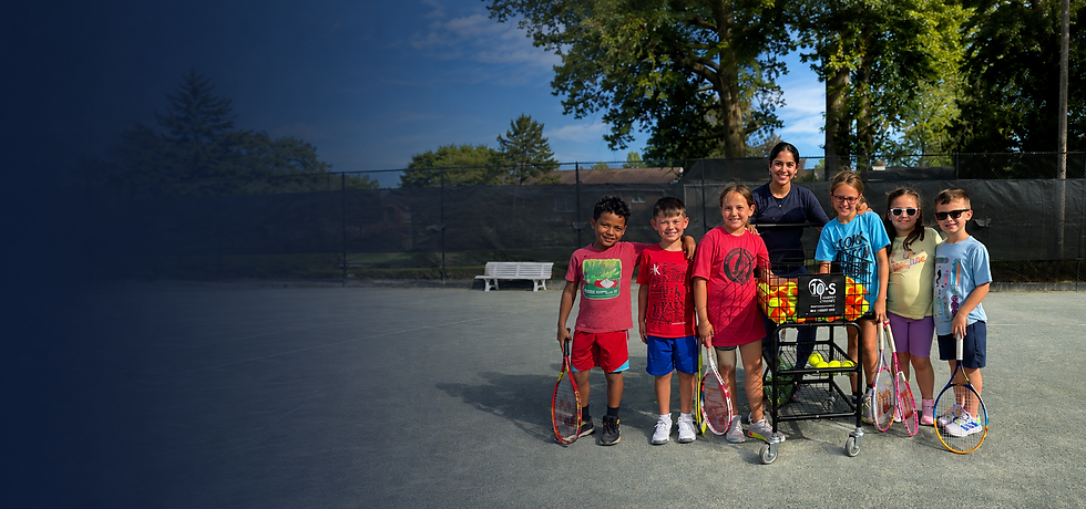 Junior tennis players practicing together on court at RCW Athletic Club.