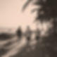 group of men walking (from the back) along a beach path.jpg
