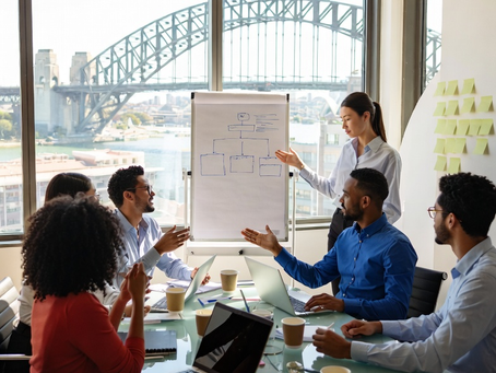 悉尼多元文化数字营销团队在现代办公室讨论2026增长策略，Blue Wave Digital专业氛围