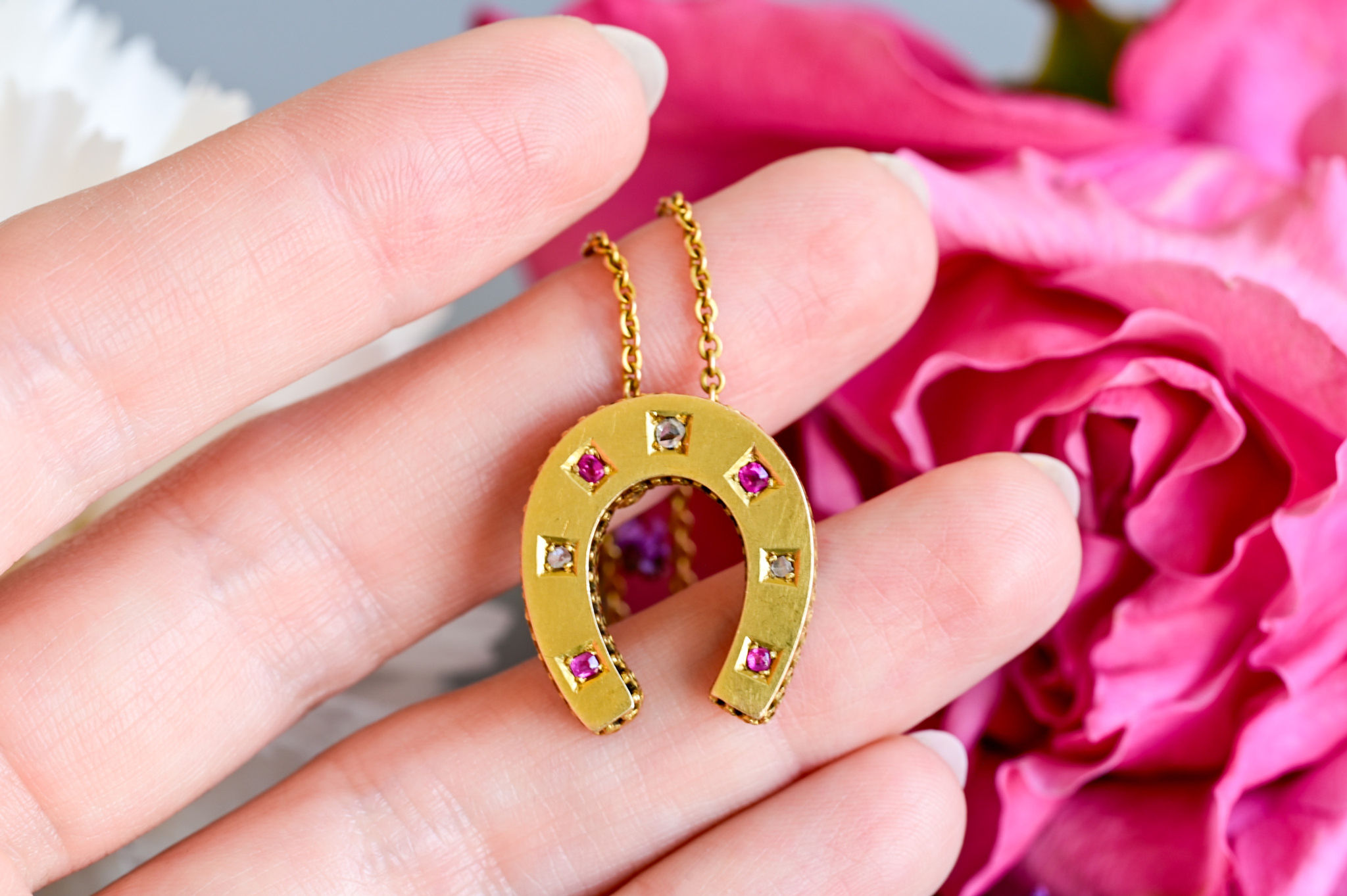 Antique Victorian ruby and diamond horseshoe necklace 9 carat gold