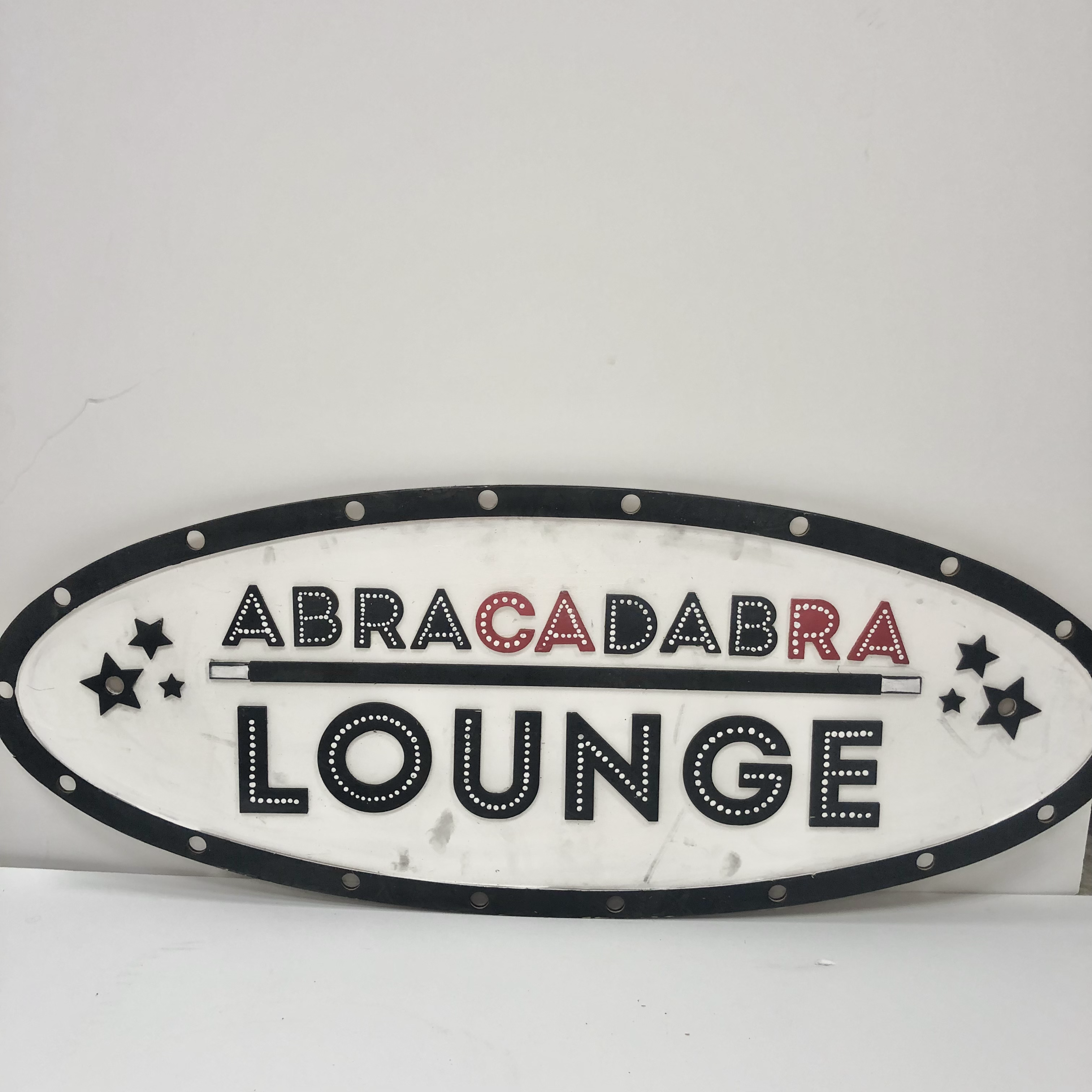 Abracadabra Lounge Sign