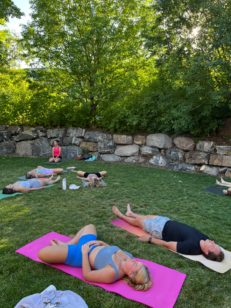 People practicing meditation in nature