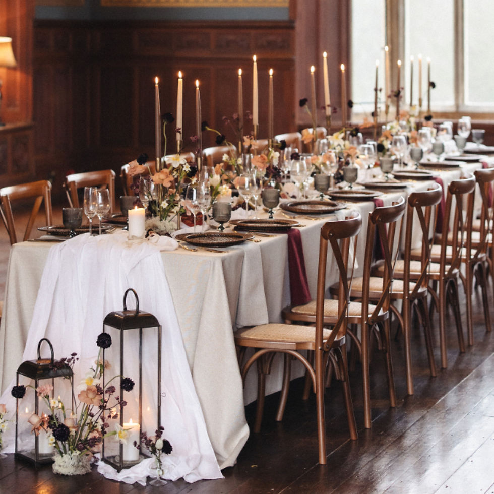 Three arm candelabras on a long banqueting table