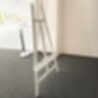 White wooden artists easel for rent wedding hire