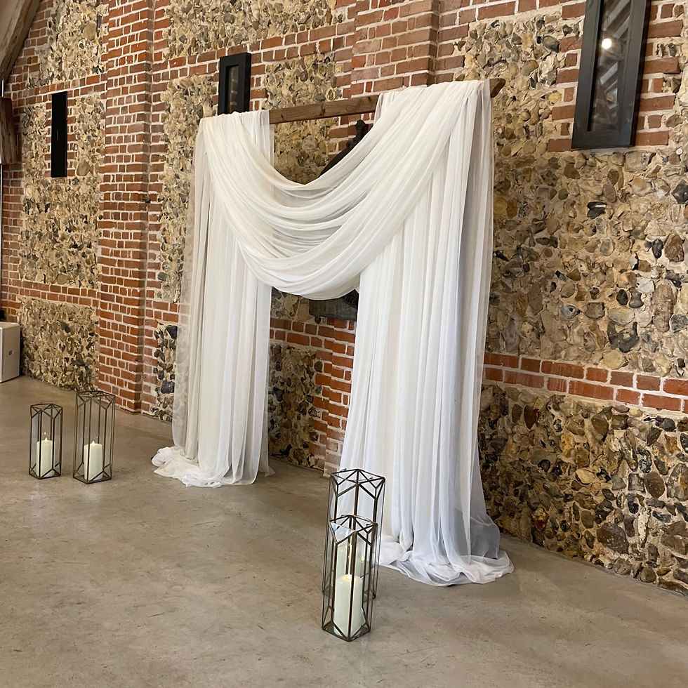 Wooden arch with draping panels