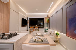 Integração cozinha+sala+varanda garante sensação de espaço