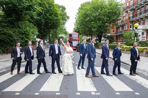 Bride with groom and best met at Abbey Road crossing