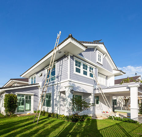 Exterior view of new house under construction and painting.Home renovation and constructio