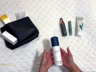 Esthetician – Lubbock, TX – sorting a client's skincare products from a makeup bag on a treatment bed