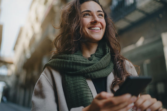 Woman Smiling on Phone