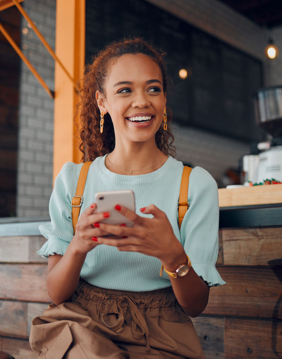 Person smiling on phone