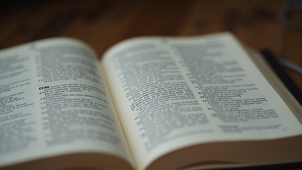Close-up view of a Bible with highlighted verses and notes