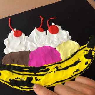 Adding details to Andy Warhol-inspired Banana Split Clay Painting