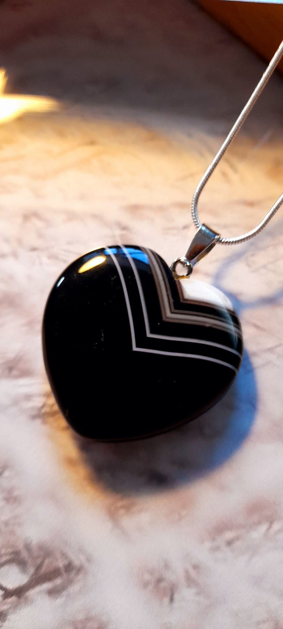 Thumbnail: Banded Black Onyx Heart Pendant