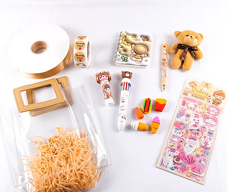 layout of empty goodie bag, decorations, toys, stickers
