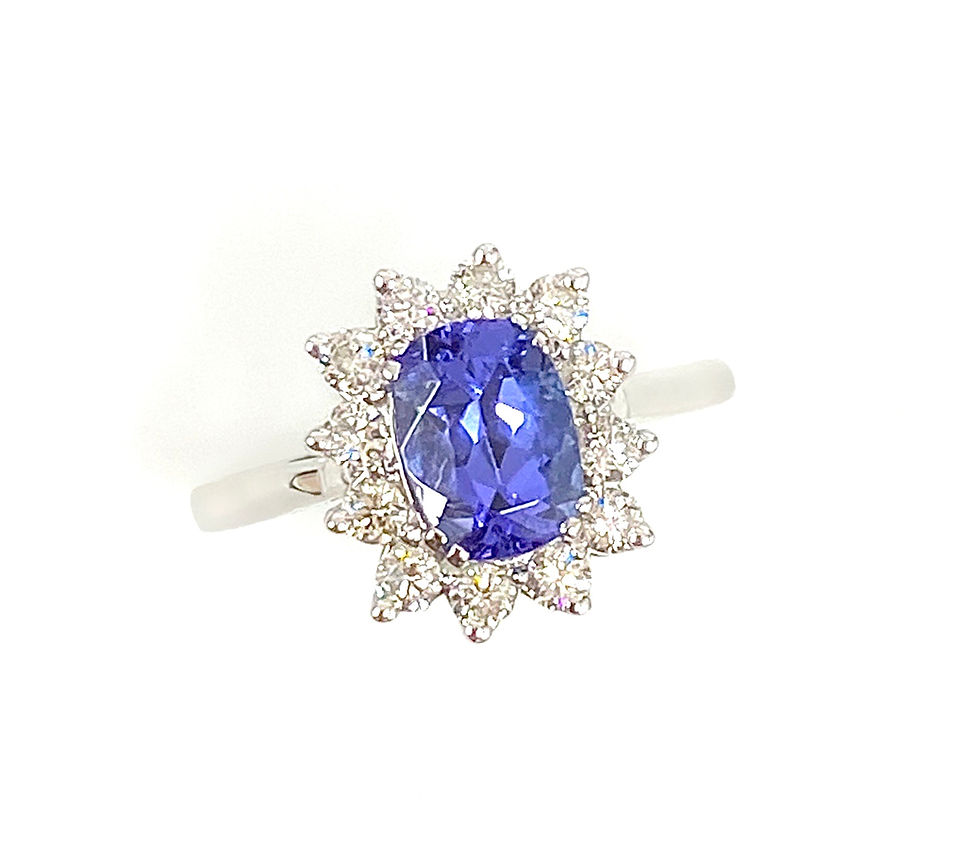 Thumbnail: 9 Carat White Gold Oval Tanzanite and Diamond Cluster Ring