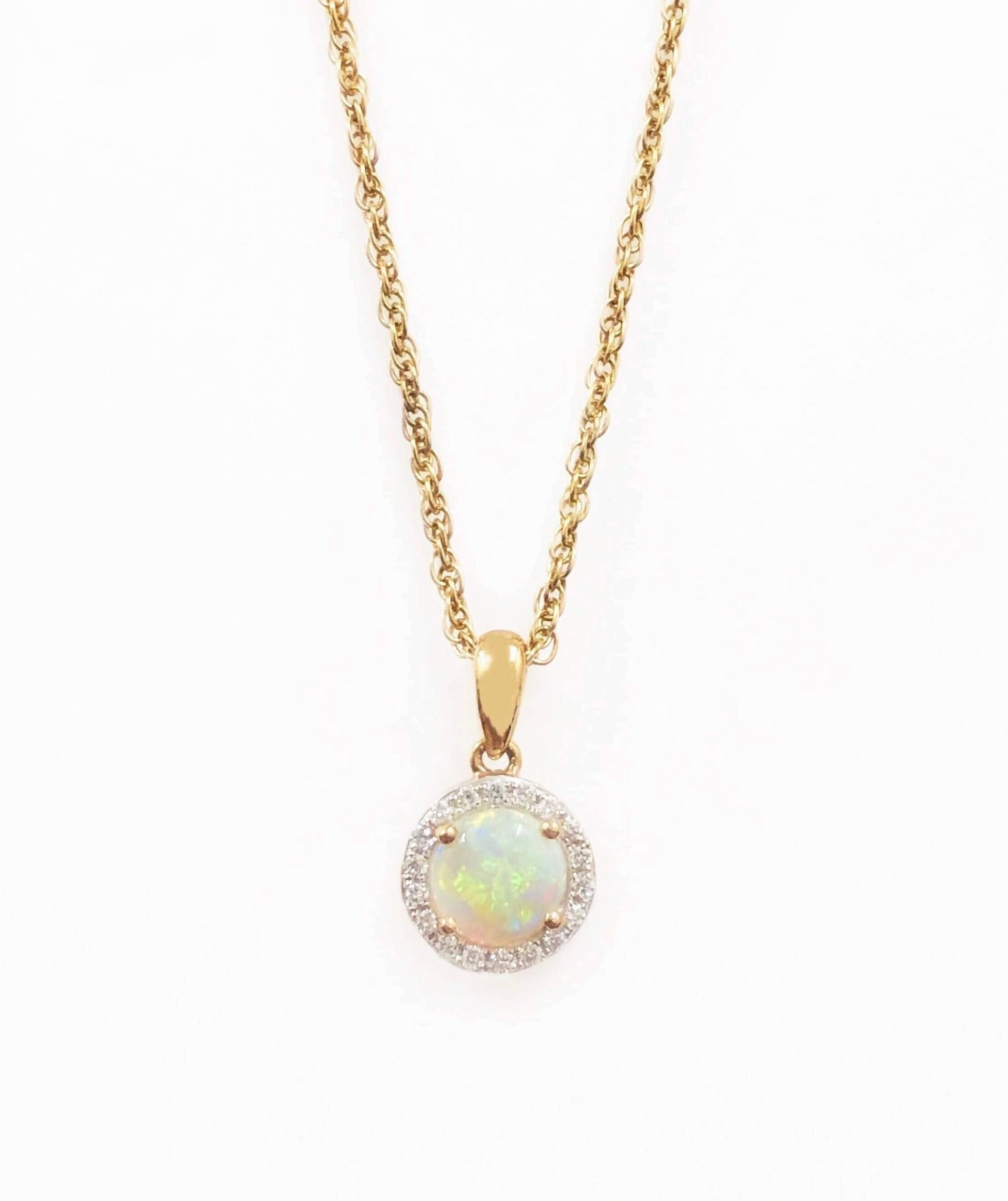 Round Cabochon Opal and Diamond Halo Pendant in 9 Carat Gold